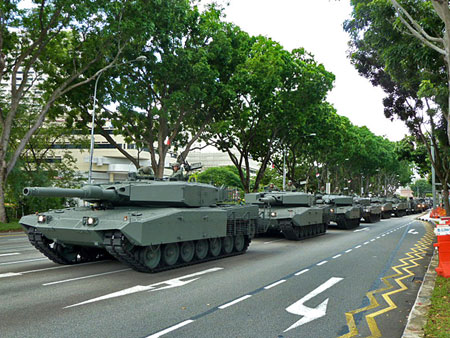 Singapore flexes its muscles! A military parade in Centre City.