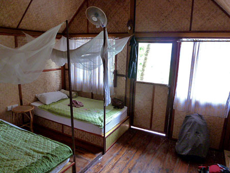 Ingphu bungalow interior with mosquito nets at Ko Phi Phi Don, Thailand.