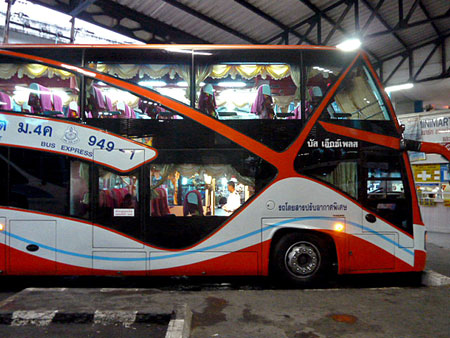 A double decker bus in Phuket Town, Thailand heading for Bangkok.