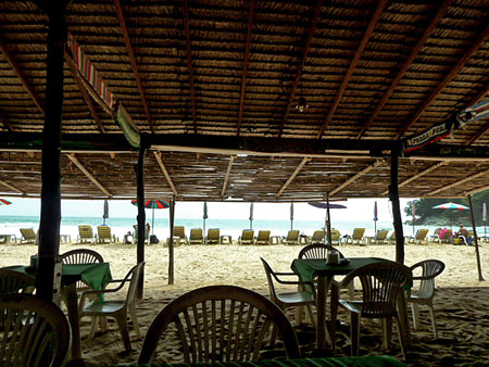 A view of the beach from a restaurant hut at Laem Singh, Phuket, Thailand.