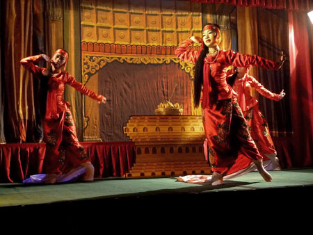 A traditional Burmese dance at Mintha Theater in Mandalay, Myanmar.