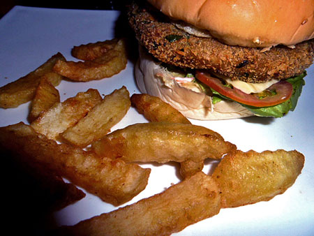 A veggie burger and seven or eight fries at V Cafe in Mandalay, Myanmar.
