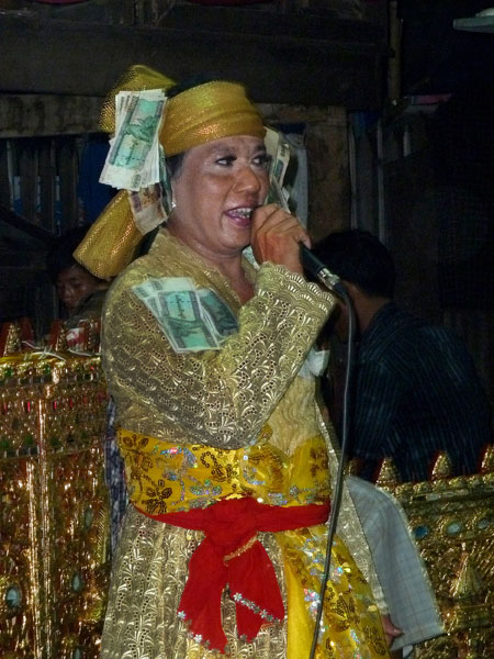 A nat kadaw commands the mic at the nat pwe in Taungbyone, Myanmar.