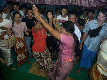 Nat worshippers engage in an ecstatic trance dance at the nat pwe in Taungbyone, Myanmar.
