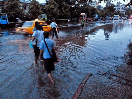 Flooded streets after an all-day rain in Yangon, Myanmar.