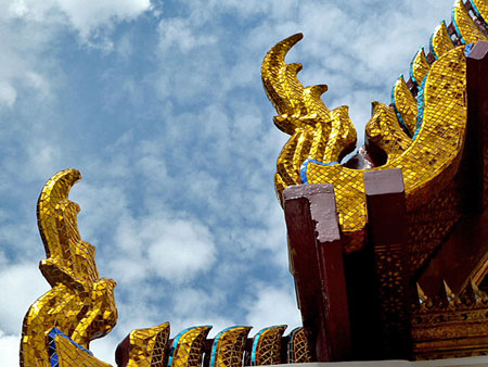Roof detail on the Temple of the Emerald Buddha in Bangkok, Thailand.