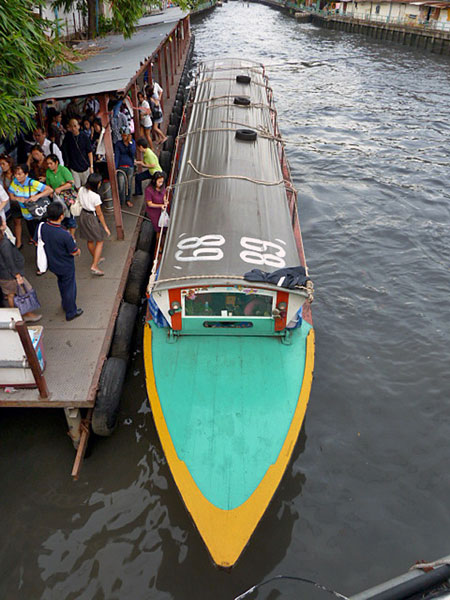 Coming right at ya! It's your everyday, basic canal taxi in Bangkok, Thailand.