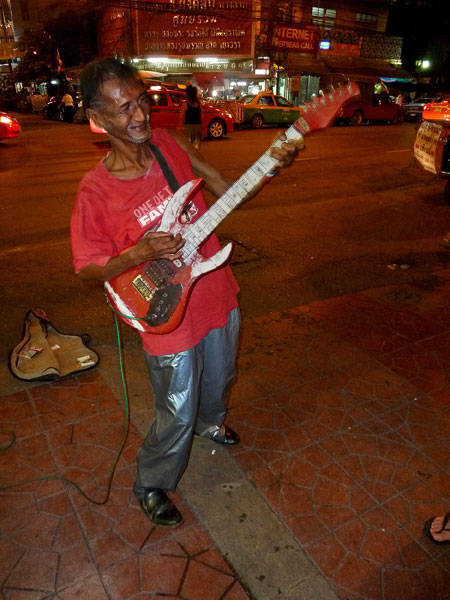 Uddy busts out with a little busk 'n' roll near Thanon Khao San in Bangkok, Thailand.