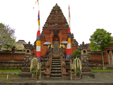 A sunlit temple on Jalon Hanoman in Ubud, Bali, Indonesia.