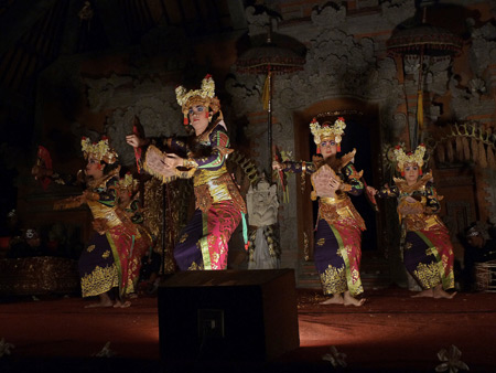 Sekaa Gong Jaya Swara performs the Legong Supraba dance at Ubud Palace in Ubud, Bali, Indonesia.