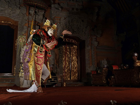 Sekaa Gong Jaya Swara performs the Topeng Arsa Wijaya dance at Ubud Palace in Ubud, Bali, Indonesia.