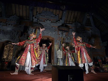Sekehe Gong Panca Artha performs the Sunda Upasunda dance at Ubud Palace in Ubud, Bali, Indonesia.