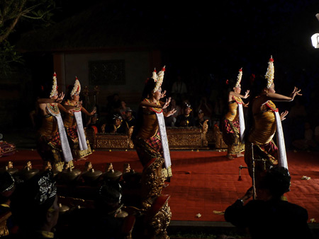 Sekehe Gong Panca Artha performs the Sisya dance at Ubud Palace in Ubud, Bali, Indonesia.