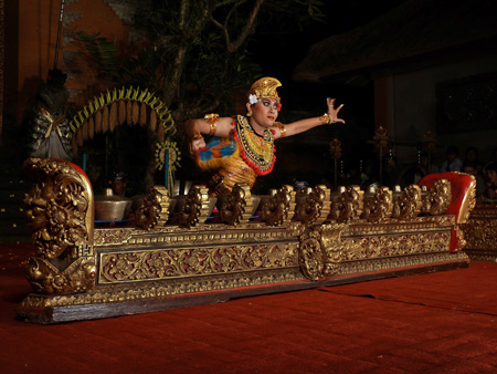 Sekehe Gong Panca Artha performs the Kebyar Trompong dance at Ubud Palace in Ubud, Bali, Indonesia.