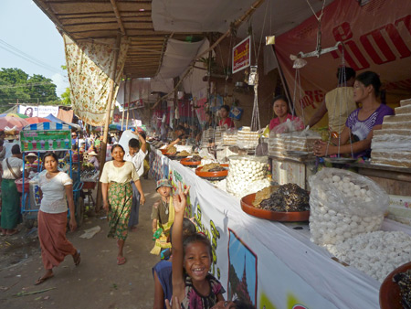 Sweet ladies quench your sweet tooth at the Nat Pwe in Taungbyone, Myanmar.