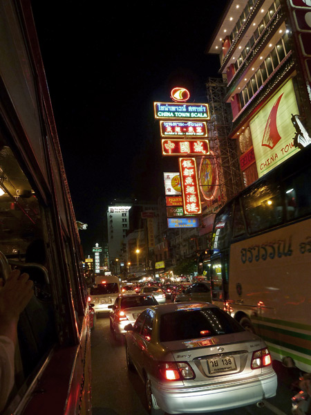 A street in Chinatown, as seen from the bus in Bangkok, Thailand.