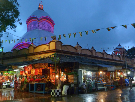 The Kali temple glows at dusk in Kolkata, India.