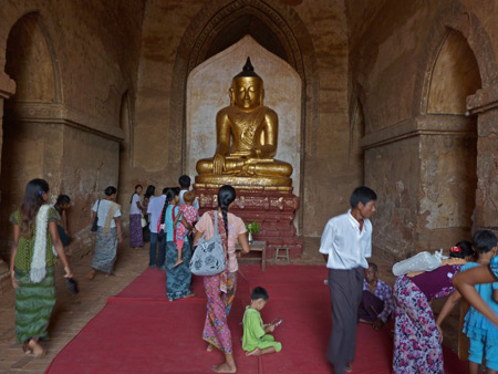 The main Buddha image inside Dhammayangyi Pahto temple in Bagan, Myanmar.