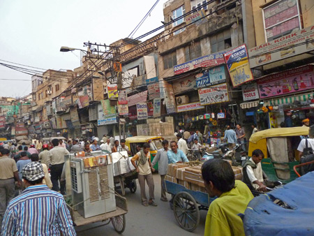 A hectic traffic jam on Chowri Bazaar in Old Delhi, India.