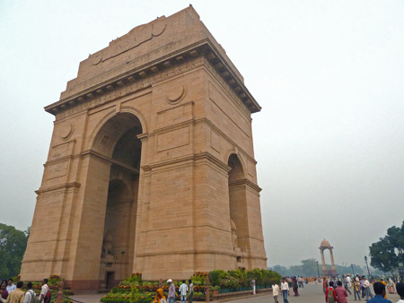 Throngs of people stroll around India Gate in Central Delhi, India.