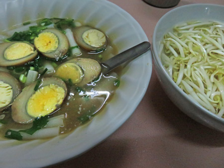 Egg, noodle and onion soup in Phitsanulok, Thailand.