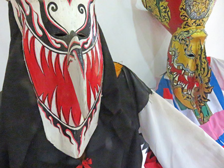 A couple of Phi Ta Khon masks at the Dan Sai Folk Museum in Dan Sai, Thailand.
