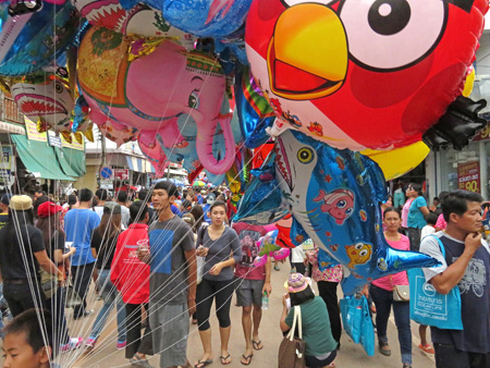 Color-splashed chaos at the Phi Ta Khon festival in Dan Sai, Thailand.