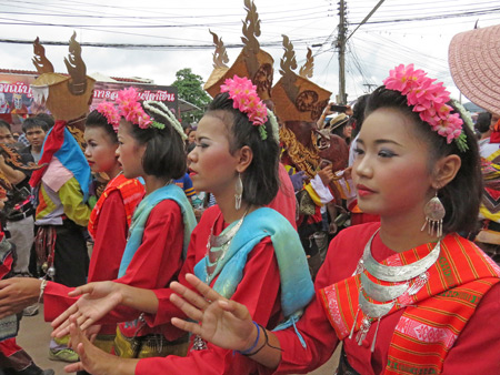 Young ladies dance in the parade at the Phi Ta Khon festival in Dan Sai, Thailand.