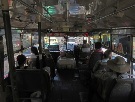 A pleasant afternoon on bus number 15 in Bangkok, Thailand.