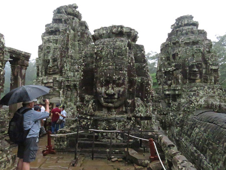 Giant faces wrought in stone at Bayon, Angkor Thom in Siem Reap, Cambodia.