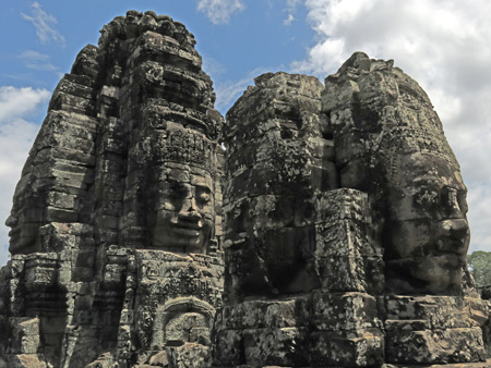 Grinning Buddha faces at Bayon, Angkor in Siem Reap, Cambodia.