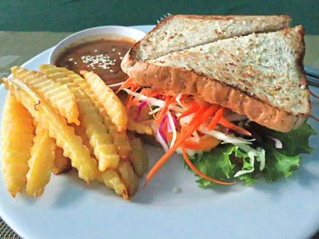 A veggie sandwich and French fries at May Kaidee's in Banglamphu, Bangkok, Thailand.
