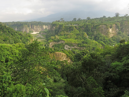 A dramatic overview of Ngarai Sianok from Taman Panorama in Bukittinggi, Sumatra, Indonesia.