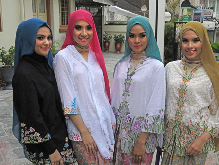 Four Muslim beauty queens in Bukittinggi, Sumatra, Indonesia.