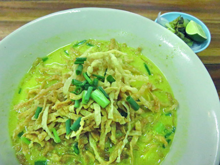 Curry, noodles and tofu on Sukhumvit Soi 38 in Bangkok, Thailand.