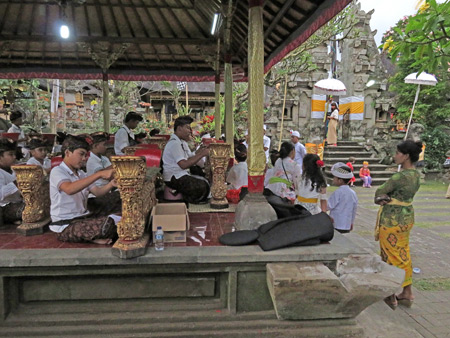 A young boys' gamelan plays during a Hindu temple ceremony at Pura Desa in Ubud, Bali, Indonesia.