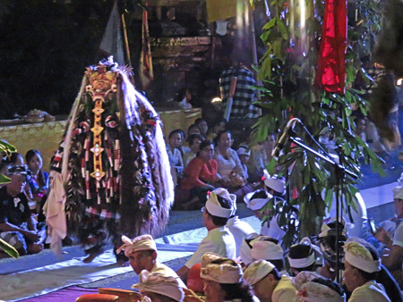 Rangda stalks the crowd as part of the Calonarang drama at Pura Desa in Ubud, Bali, Indonesia.