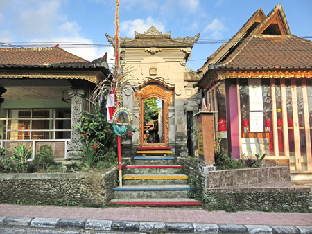 A family compound gate on Jalon Sukma in Peliatan, Bali, Indonesia.