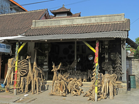 A wood carving shop on Jalan Raya Andong in Andong, Ubud, Bali, Indonesia.
