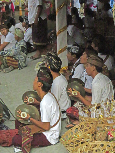 A gamelan plays at a small Hindu cremation ceremony in Penestanan, Ubud, Bali, Indonesia.