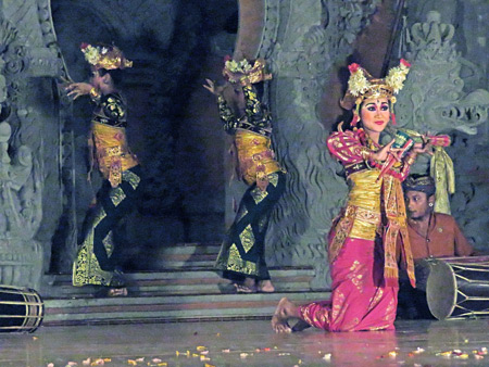 Sanggar Suwara Guna Kanti performs the Legong Lasem dance at Bale Banjar Ubud Kelod in Ubud, Bali, Indonesia.