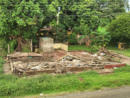 A disintegrated house across the street from the Cabinas Minitigre in Puerto Jimenez, Costa Rica.