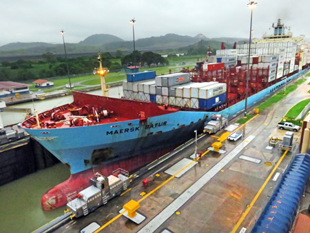 Water is drained from the lock, lowering the Maersk Batur at the Miraflores Locks of the Panama Canal just outside Panama City, Panama.