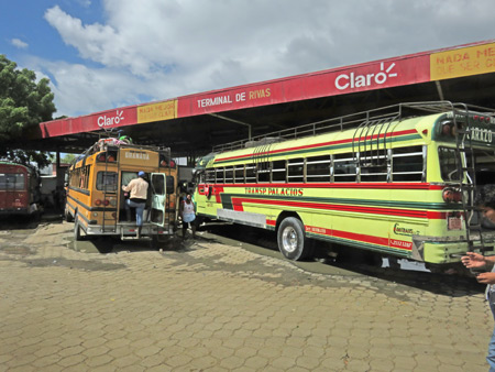 Chicken buses at the terminal in Rivas, Nicaragua.