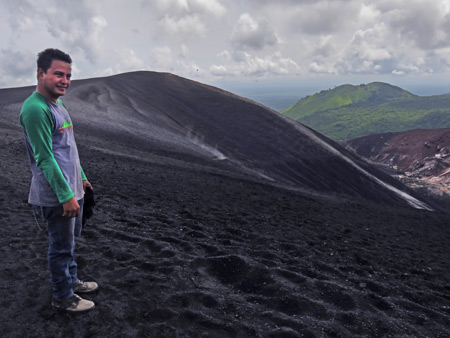 Luis stands at the top of Cerro Negro, Nicaragua.