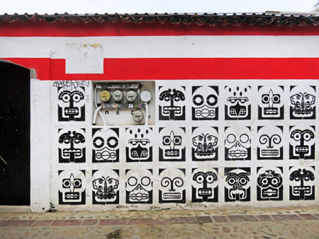A skull-festooned wall in Oaxaca City, Mexico.