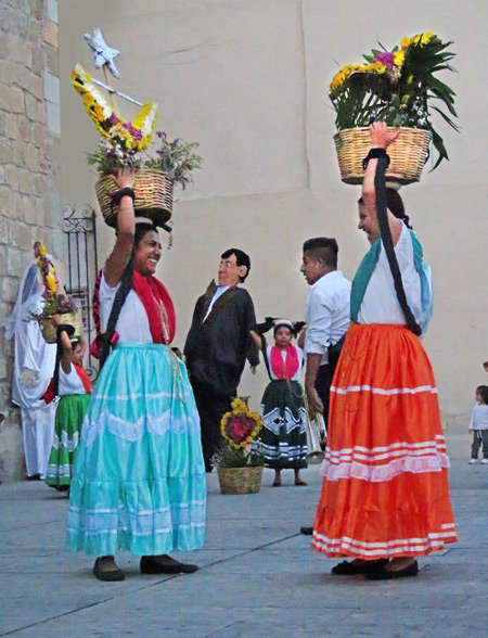 Traditional Oaxacan dancers prepare to perform at a wedding in Oaxaca City, Mexico.