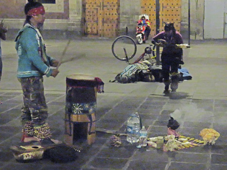 Aztec musicians perform next to the Zocalo in Mexico City, Mexico.