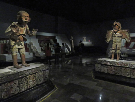 A couple of large figures loom at the Museo Templo Mayor in Mexico City, Mexico.