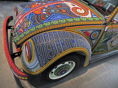 A Volkswagen Beetle covered with psychedelic beads at the Museo de Arte Popular in Mexico City, Mexico.